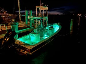 Bad Juju Charters Boat at Night