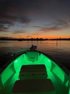 Bad Juju Charters Boat at Night